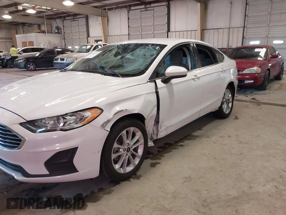 2020 Ford Fusion Hybrid SE with VIN 3FA6P0LU7LR173500, listed as a IAAI auction lot 41368311 with 105,202 mi miles. Bid and sale history available at carsss.com. Image 6.
