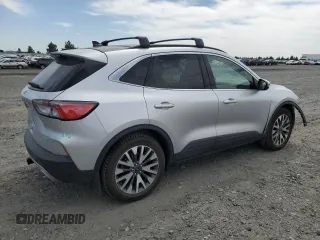 2020 Ford Escape Titanium with VIN 1FMCU9J99LUB07009, listed as a Copart auction lot 63213495 with 61,376 mi miles and Salvage title. Bid and sale history available at DreamBid. Image 3.