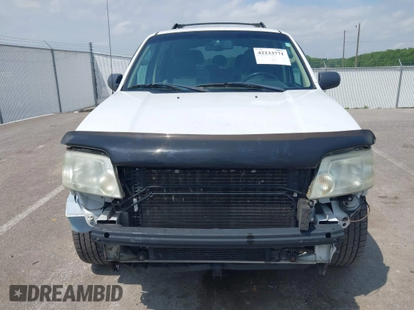 2007 Mercury Mariner Premier z VIN 4M2CU87107KJ12711, wystawiony jako IAAI lot #42233771 z przebiegiem 182 355 mil mil oraz . Historia ofert i sprzedaży dostępna na DreamBid. Obrazek 6.