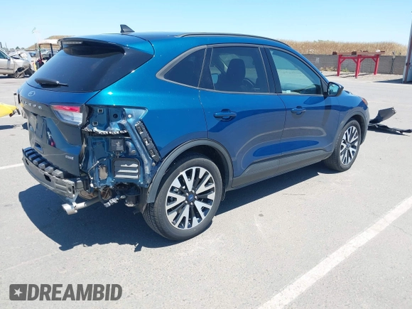 2020 Ford Escape SE Sport Hybrid with VIN 1FMCU0BZ1LUC15585, listed as a IAAI auction lot 42205354 with 21,044 mi miles and . Bid and sale history available at carsss.com. Image 4.