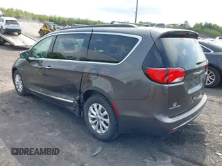 2017 Chrysler Pacifica Touring L with VIN 2C4RC1BG5HR705277, listed as a IAAI auction lot 42230036 with 75,287 mi miles and . Bid and sale history available at DreamBid. Image 3.