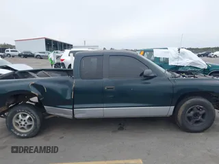 1998 Dodge Dakota SLT with VIN 1B7GL22X1WS615049, listed as a IAAI auction lot 41369967 with 259,598 mi miles and . Bid and sale history available at DreamBid. Image 13.