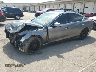 2014 Infiniti Q50 z VIN JN1BV7AP0EM690933, wystawiony jako Copart lot #61128185 z przebiegiem 151 552 mil mil oraz Szkoda całkowita • Salvage title. Historia ofert i sprzedaży dostępna na DreamBid. Obrazek 1.