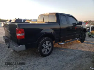 2005 Ford F-150 XLT with VIN 1FTRX12515FB28205, listed as a Copart auction lot 82707324 with 249,349 mi miles and Salvage Title. Bid and sale history available at carsss.com. Image 3.