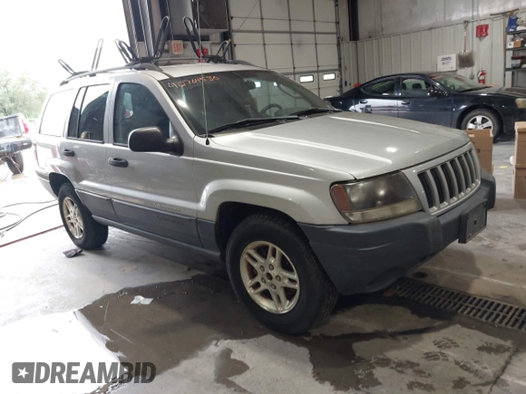 2004 Jeep Grand Cherokee Laredo with VIN 1J4GW48S44C161864, listed as a IAAI auction lot 42764536 with 143,833 mi miles and . Bid and sale history available at DreamBid. Image 1.