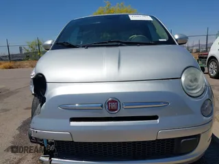 2014 FIAT 500 Pop z VIN 3C3CFFAR9ET188043, wystawiony jako IAAI lot #42082587 z przebiegiem 187 513 mil mil oraz . Historia ofert i sprzedaży dostępna na DreamBid. Obrazek 13.