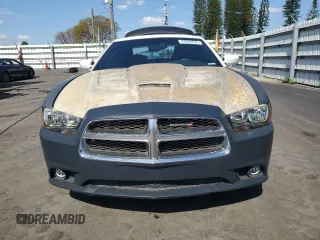 2013 Dodge Charger SE with VIN 2C3CDXBG8DH677551, listed as a Copart auction lot 53260735 with 124,248 mi miles and Salvage Title. Bid and sale history available at DreamBid. Image 5.