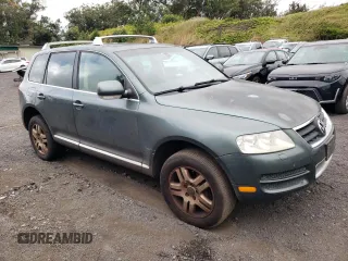 2006 Volkswagen Touareg 4.2L V8 z VIN WVGZM77L16D049631, wystawiony jako Copart lot #84882844 z przebiegiem Nie podano mil oraz Szkoda całkowita • Salvage title. Historia ofert i sprzedaży dostępna na DreamBid. Obrazek 4.