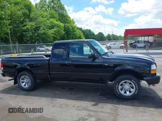 2000 Ford Ranger XL z VIN 1FTYR14V9YTA24442, wystawiony jako IAAI lot #42240524 z przebiegiem 152 668 mil mil oraz . Historia ofert i sprzedaży dostępna na DreamBid. Obrazek 13.