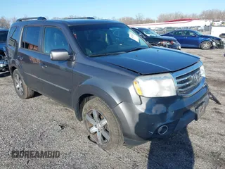 2012 Honda Pilot Touring with VIN 5FNYF3H9XCB042090, listed as a IAAI auction lot 41751359 with 140,424 mi miles and . Bid and sale history available at carsss.com. Image 1.