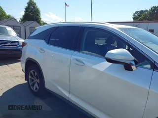 2018 Lexus RX 350L Premium z VIN JTJDZKCAXJ2006088, wystawiony jako IAAI lot #42332914 z przebiegiem 104 393 mil mil oraz . Historia ofert i sprzedaży dostępna na DreamBid. Obrazek 13.