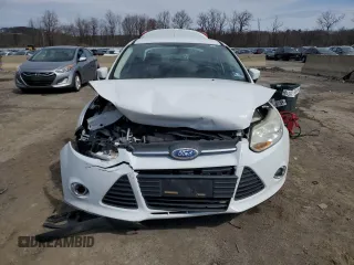 2012 Ford Focus SE with VIN 1FAHP3F25CL213172, listed as a Copart auction lot 51518755 with 67,520 mi miles and Salvage Title. Bid and sale history available at carsss.com. Image 5.