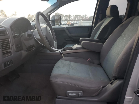 2005 Nissan Titan SE with VIN 1N6BA06B45N539629, listed as a Copart auction lot 82527074 with 154,255 mi miles and Salvage title. Bid and sale history available at DreamBid. Image 7.