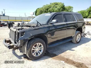 2019 Chevrolet Tahoe LT with VIN 1GNSKBKC6KR362443, listed as a Copart auction lot 56574775 with 121,617 mi miles and Salvage title. Bid and sale history available at DreamBid. Image 1.