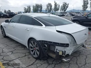 2016 Jaguar XJ with VIN SAJWA2GE3GMV93216, listed as a IAAI auction lot 41890225 with 70,007 mi miles. Bid and sale history available at carsss.com. Image 3.