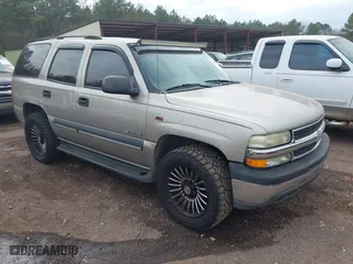 2003 Chevrolet Tahoe LS with VIN 1GNEC13V43R225216, listed as a IAAI auction lot 41535824 with 246,536 mi miles. Bid and sale history available at carsss.com. Image 1.