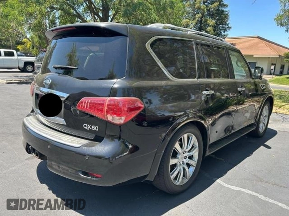 2014 Infiniti QX80 z VIN JN8AZ2NE6E9062908, wystawiony jako Copart lot #61263115 z przebiegiem 155 836 mil mil oraz Czysty tytuł • Clean title. Historia ofert i sprzedaży dostępna na DreamBid. Obrazek 4.
