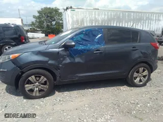 2013 Kia Sportage LX with VIN KNDPB3A20D7426925, listed as a IAAI auction lot 39816145 with 167671 miles. Bid and sale history available at carsss.com. Image 6.