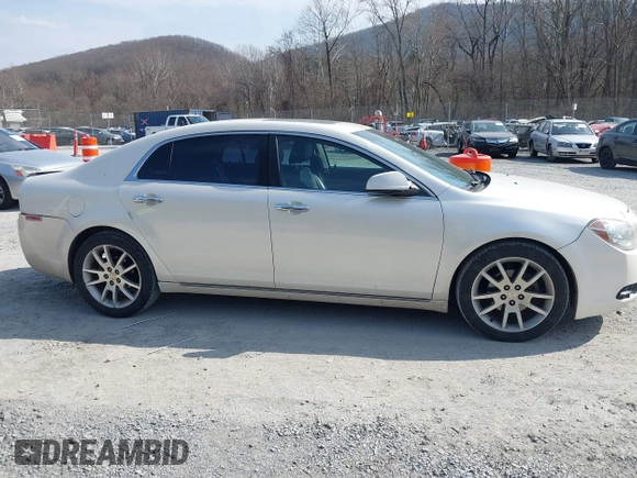 2011 Chevrolet Malibu LTZ with VIN 1G1ZE5E76BF201423, listed as a IAAI auction lot 41781995 with 144,428 mi miles and . Bid and sale history available at DreamBid. Image 13.