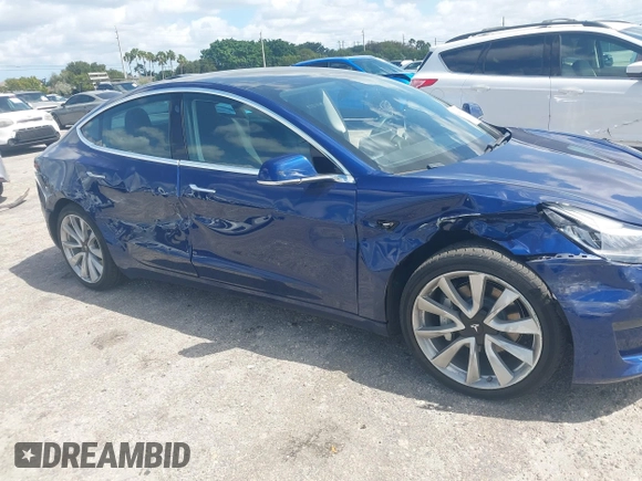 2020 Tesla Model 3 Standard Range Plus z VIN 5YJ3E1EA6LF785622, wystawiony jako IAAI lot #42080180 z przebiegiem 34 133 mil mil oraz . Historia ofert i sprzedaży dostępna na DreamBid. Obrazek 6.