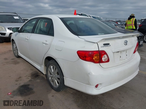 2010 Toyota Corolla with VIN 2T1BU4EEXAC521114, listed as a IAAI auction lot 42066903 with 208,509 mi miles. Bid and sale history available at carsss.com. Image 3.