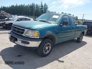 1998 Ford F-150 z VIN 2FTZX18W5WCA21252, wystawiony jako IAAI lot #42479264 z przebiegiem 259 489 mil mil oraz . Historia ofert i sprzedaży dostępna na DreamBid. Obrazek 2.