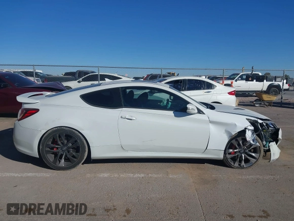 2013 Hyundai Genesis Coupe R-Spec z VIN KMHHU6KJ2DU101504, wystawiony jako IAAI lot #41469836 z przebiegiem 98 779 mil mil oraz . Historia ofert i sprzedaży dostępna na DreamBid. Obrazek 13.