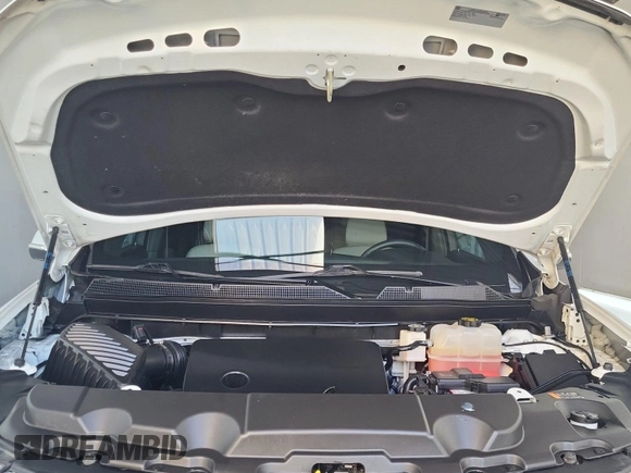 2022 Chevrolet Traverse LT with VIN 1GNERHKW7NJ177665, listed as a IAAI auction lot 42667314 with 103,830 mi miles and . Bid and sale history available at DreamBid. Image 4.