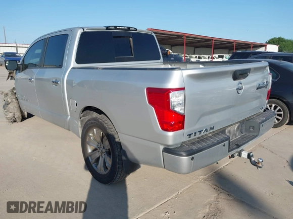2018 Nissan Titan SV with VIN 1N6AA1E62JN502207, listed as a IAAI auction lot 41996558 with 133,051 mi miles and . Bid and sale history available at DreamBid. Image 3.