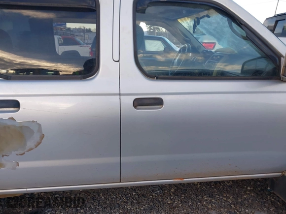 2003 Nissan Frontier SE z VIN 1N6ED29X33C433737, wystawiony jako IAAI lot #41271135 z przebiegiem 289 098 mil mil oraz . Historia ofert i sprzedaży dostępna na DreamBid. Obrazek 13.