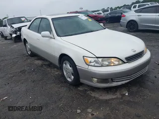 2001 Lexus ES 300 z VIN JT8BF28G410307451, wystawiony jako IAAI lot #42369871 z przebiegiem 290 620 mil mil oraz . Historia ofert i sprzedaży dostępna na DreamBid. Obrazek 1.