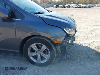 2020 Honda Odyssey EX with VIN 5FNRL6H54LB052660, listed as a IAAI auction lot 42051157 with 51,159 mi miles and . Bid and sale history available at DreamBid. Image 17.