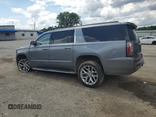 2019 GMC Yukon XL SLT z VIN 1GKS1GKC0KR325305, wystawiony jako Copart lot #56219325 z przebiegiem 136 295 mil mil oraz Szkoda całkowita • Salvage title. Historia ofert i sprzedaży dostępna na DreamBid. Obrazek 2.