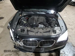 2015 BMW 7 Series 740Li xDrive with VIN WBAYF4C55FG291706, listed as a Copart auction lot 41992355 with 76,483 mi miles and Salvage Title. Bid and sale history available at carsss.com. Image 14.