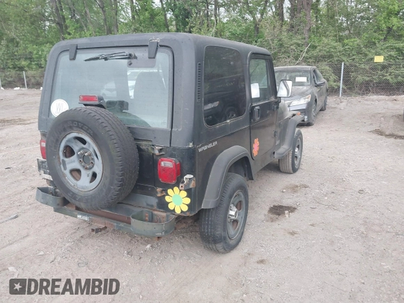 1995 Jeep Wrangler S with VIN 1J4FY19P4SP242027, listed as a IAAI auction lot 42149833 with 158,695 mi miles. Bid and sale history available at carsss.com. Image 4.