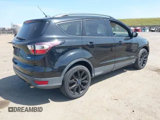 2017 Ford Escape SE with VIN 1FMCU0G9XHUE37185, listed as a IAAI auction lot 42053979 with 72,904 mi miles. Bid and sale history available at carsss.com. Image 4.