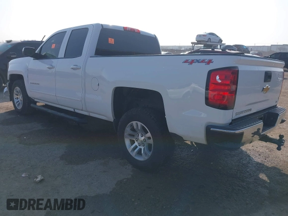 2015 Chevrolet Silverado 1500 LT with VIN 1GCVKREC3FZ446851, listed as a IAAI auction lot 41503353 with Not Provided miles and . Bid and sale history available at DreamBid. Image 3.