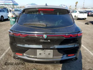 2024 Alfa Romeo Tonale Veloce z VIN ZASPATDW4R3051951, wystawiony jako Copart lot #74505854 z przebiegiem 1558 mil mil oraz Szkody całkowita. Historia ofert i sprzedaży dostępna na DreamBid. Obrazek 6.