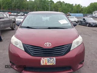 2014 Toyota Sienna L z VIN 5TDZK3DC2ES505680, wystawiony jako IAAI lot #42307763 z przebiegiem 170 628 mil mil oraz . Historia ofert i sprzedaży dostępna na DreamBid. Obrazek 12.