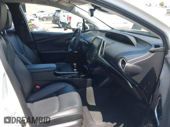 2021 Toyota Prius LE z VIN JTDKAMFP3M3187644, wystawiony jako IAAI lot #42443171 z przebiegiem 126 977 mil mil oraz . Historia ofert i sprzedaży dostępna na DreamBid. Obrazek 5.