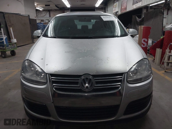 2009 Volkswagen Jetta Sedan SE with VIN 3VWRM71K09M033754, listed as a IAAI auction lot 41949678 with 198,344 mi miles. Bid and sale history available at carsss.com. Image 12.
