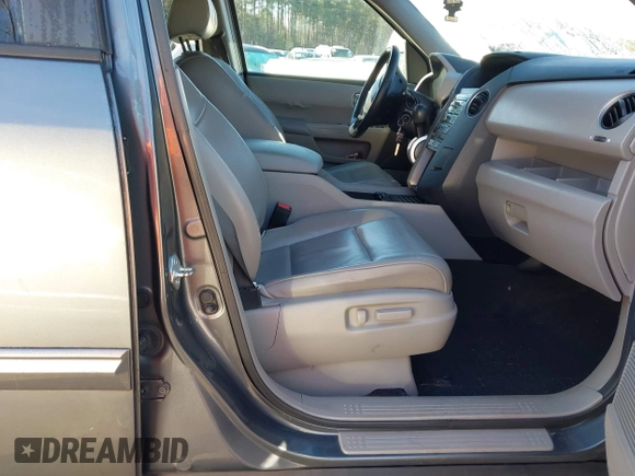2011 Honda Pilot EX-L with VIN 5FNYF3H66BB018616, listed as a IAAI auction lot 41449001 with 221,499 mi miles and . Bid and sale history available at DreamBid. Image 5.
