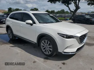 2021 Mazda CX-9 Grand Touring with VIN JM3TCADY7M0501717, listed as a Copart auction lot 59402875 with 53,218 mi miles and Salvage title. Bid and sale history available at DreamBid. Image 4.