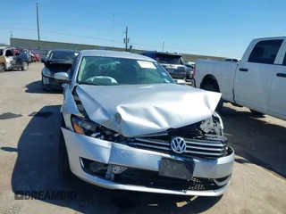 2015 Volkswagen Passat 1.8T Limited Edition with VIN 1VWAT7A30FC014689, listed as a IAAI auction lot 41758748 with 140,545 mi miles. Bid and sale history available at carsss.com. Image 13.