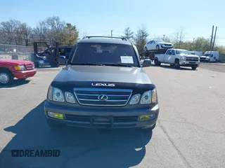 2003 Lexus LX with VIN JTJHT00W033531066, listed as a IAAI auction lot 41969617 with 209,710 mi miles. Bid and sale history available at carsss.com. Image 6.