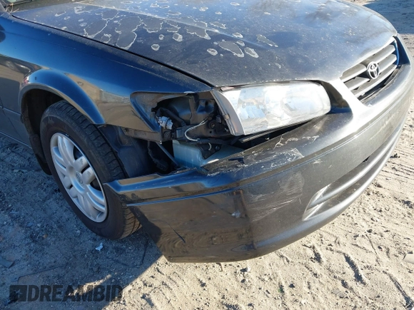 2001 Toyota Camry CE with VIN 4T1BG22K41U842473, listed as a IAAI auction lot 41858322 with 203,696 mi miles. Bid and sale history available at carsss.com. Image 6.