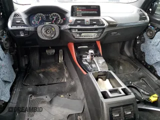 2020 BMW X3 M Competition z VIN 5YMTS0C0XL9B17548, wystawiony jako Copart lot #56528535 z przebiegiem 62 670 mil mil oraz Szkody całkowita. Historia ofert i sprzedaży dostępna na DreamBid. Obrazek 8.