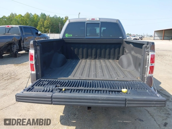 2014 Ford F-150 XL with VIN 1FTFW1CF2EKF75517, listed as a IAAI auction lot 40534480 with 121,035 mi miles. Bid and sale history available at carsss.com. Image 16.