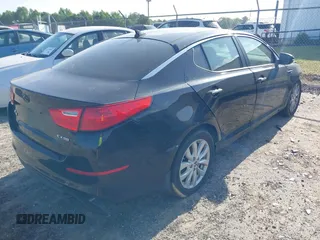 2014 Kia Optima EX with VIN 5XXGN4A70EG277871, listed as a IAAI auction lot 42183248 with 128,300 mi miles and . Bid and sale history available at carsss.com. Image 4.