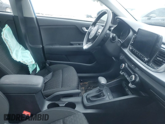 2022 Kia Rio S with VIN 3KPA25AD1NE437713, listed as a Copart auction lot 89347655 with 27,188 mi miles and Salvage Title. Bid and sale history available at DreamBid. Image 7.